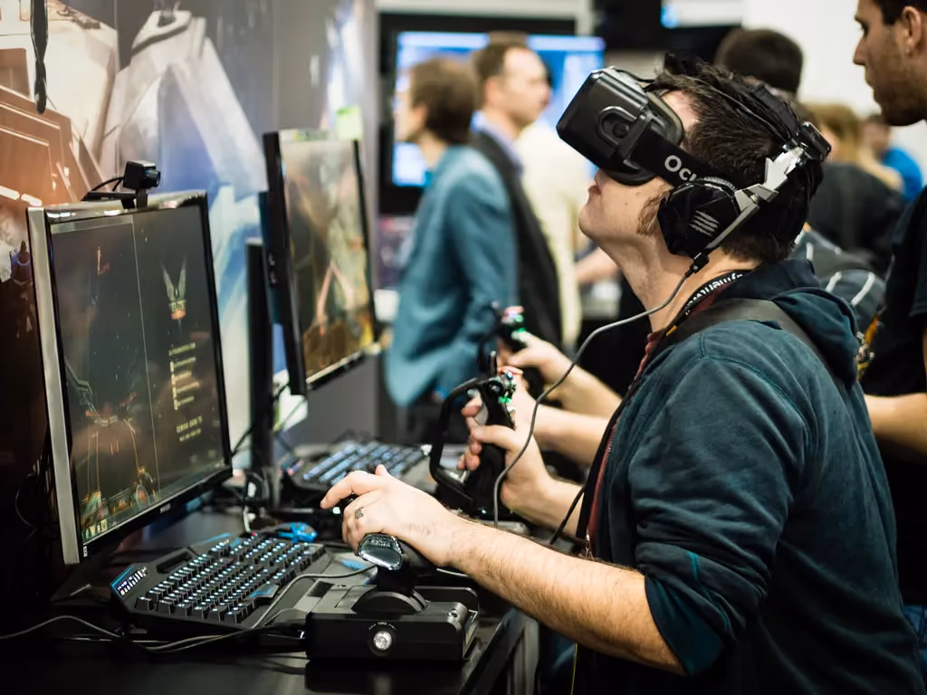 Person wearing a VR headset, immersed in a virtual environment.
